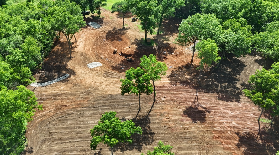 Pond earthwork image from the existing Jae project; provenance awaiting confirmation
